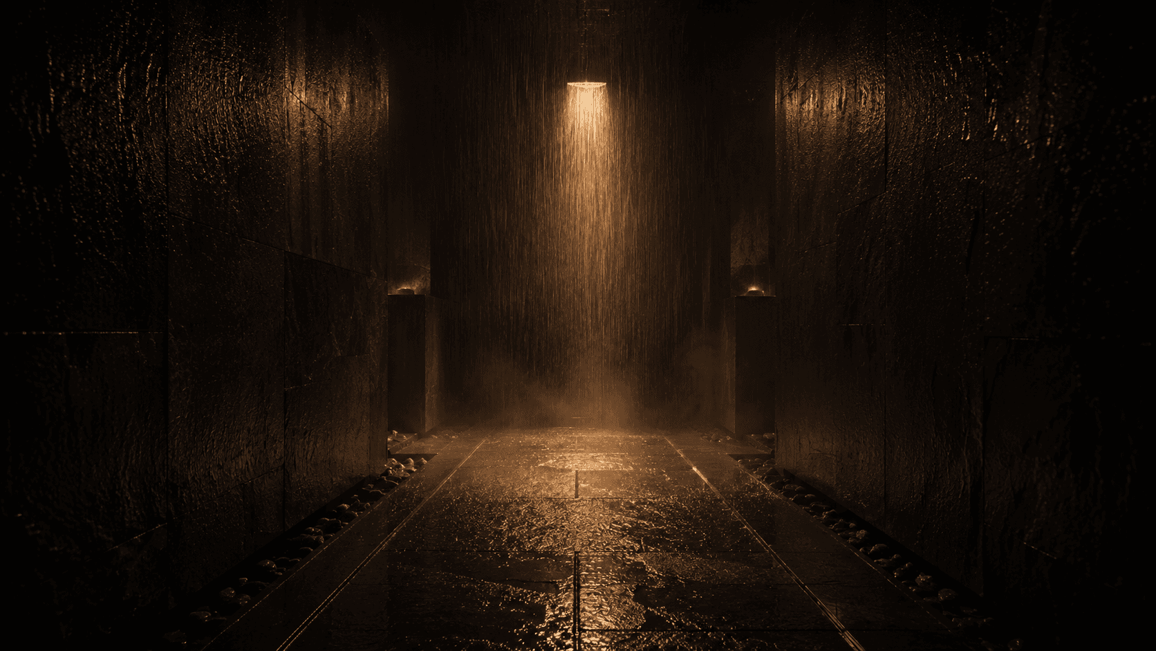 The rain room at Yumori — warm rain falling from a single overhead source onto wet dark stone, narrow corridor walls receding into shadow